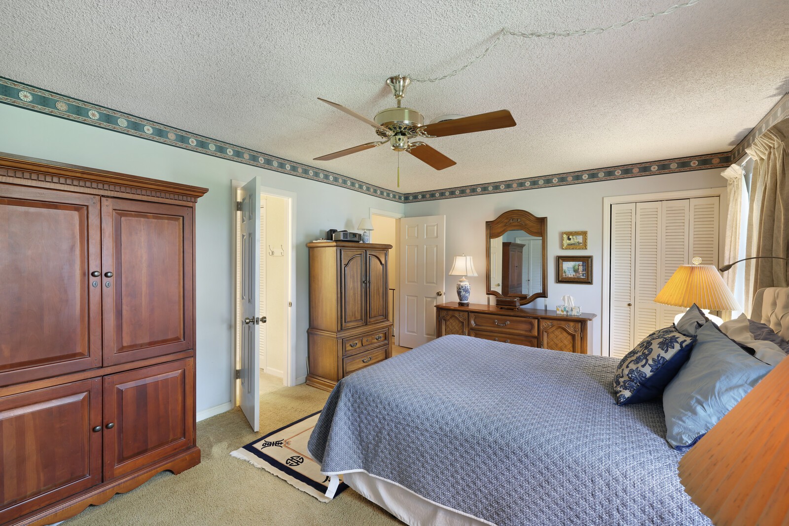 4001 Anderson Road, Unit K24 Nashville, TN 37217 - Photo 19 of 36 a bedroom with a bed and wooden floor