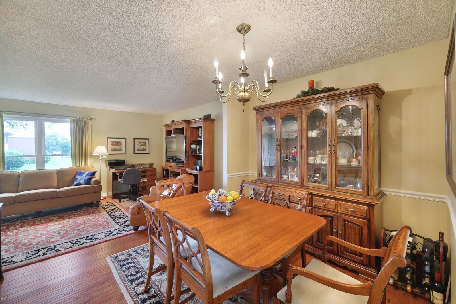 4001 Anderson Road, Unit K24 Nashville, TN 37217 - Photo 10 of 36 a view of a dining room with furniture window and wooden floor