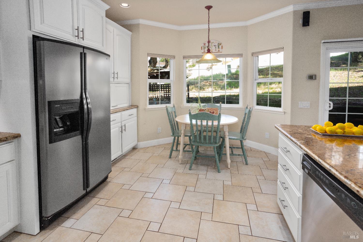 230 Clear Ridge Drive Healdsburg, CA 95448 - Photo 19 of 48 a kitchen with stainless steel appliances granite countertop a refrigerator and a sink