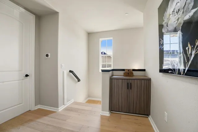 a view of a livingroom with wooden floor