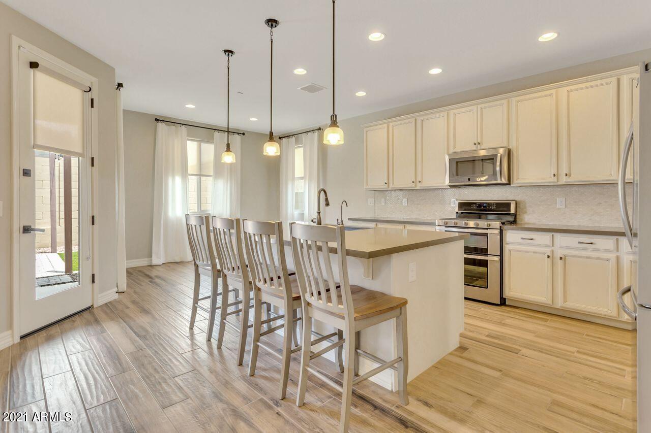 21362 West Berkeley Road Buckeye, AZ 85396 - Photo 5 of 33 QPT_Photo_-__L1A3467