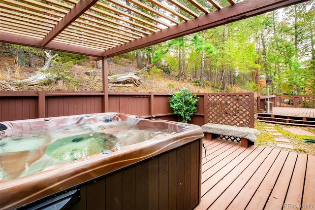a view of balcony with furniture