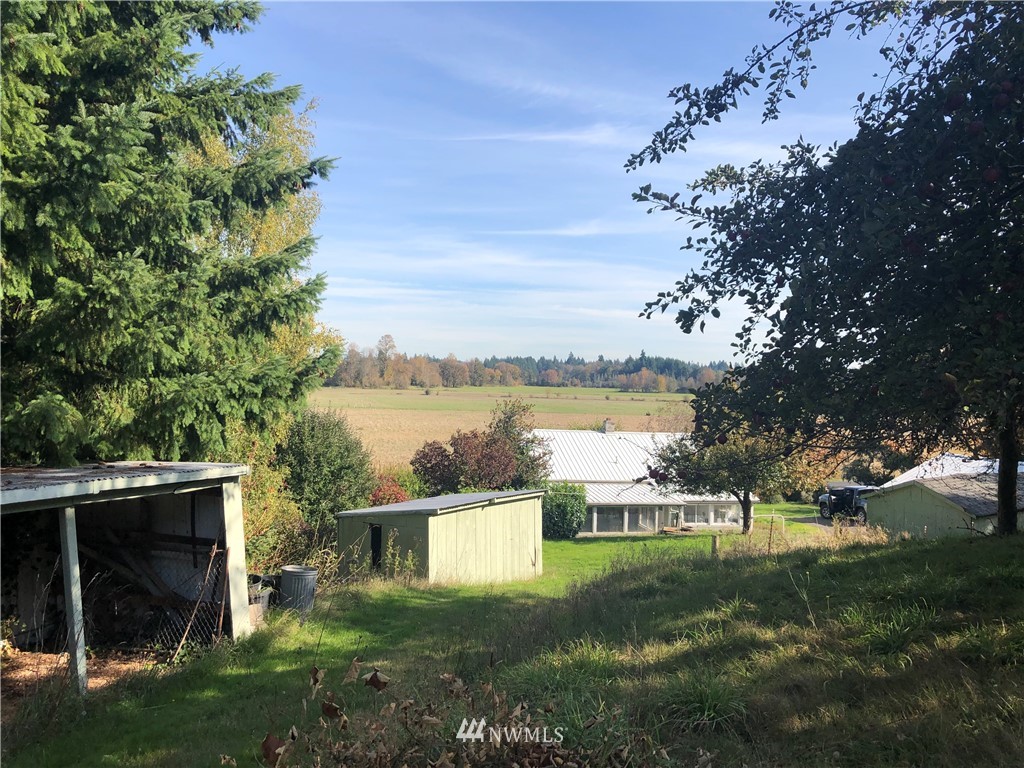 380 Newaukum Valley Road Chehalis, WA 98532 - Photo 5 of 19 a view of a garden and lake