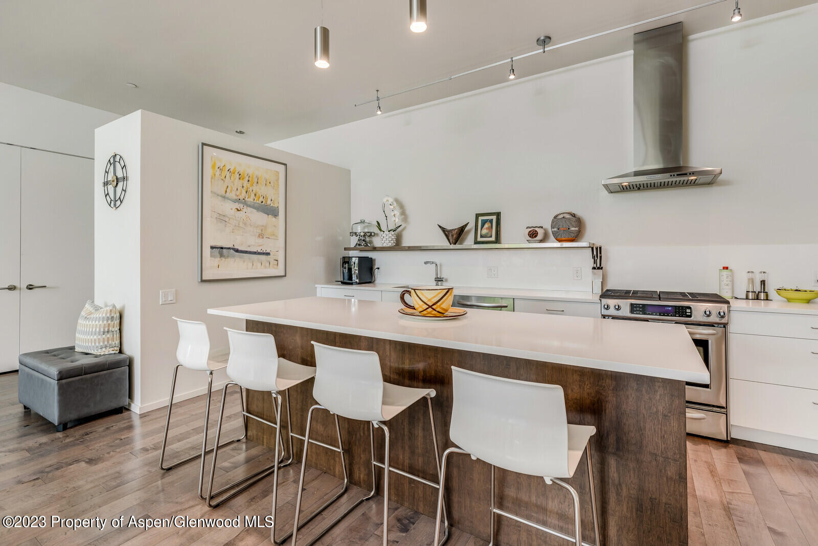 202 Evans Road, Unit 105 Basalt, CO 81621 - Photo 12 of 27 a kitchen with a dining table and chairs