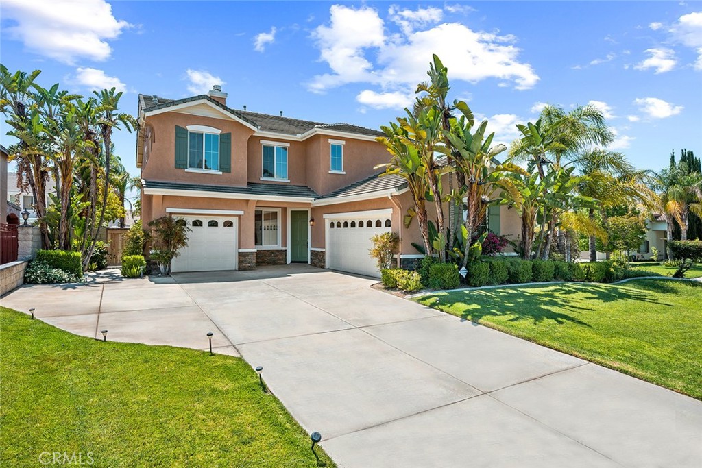 8469 Applegate Court Riverside, CA 92508 - Photo 1 of 1 a front view of a house with a yard