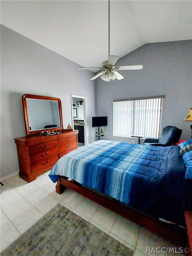 9306 East Gospel Island Road Inverness, FL 34450 - Photo 8 of 16 a bedroom with bed and window