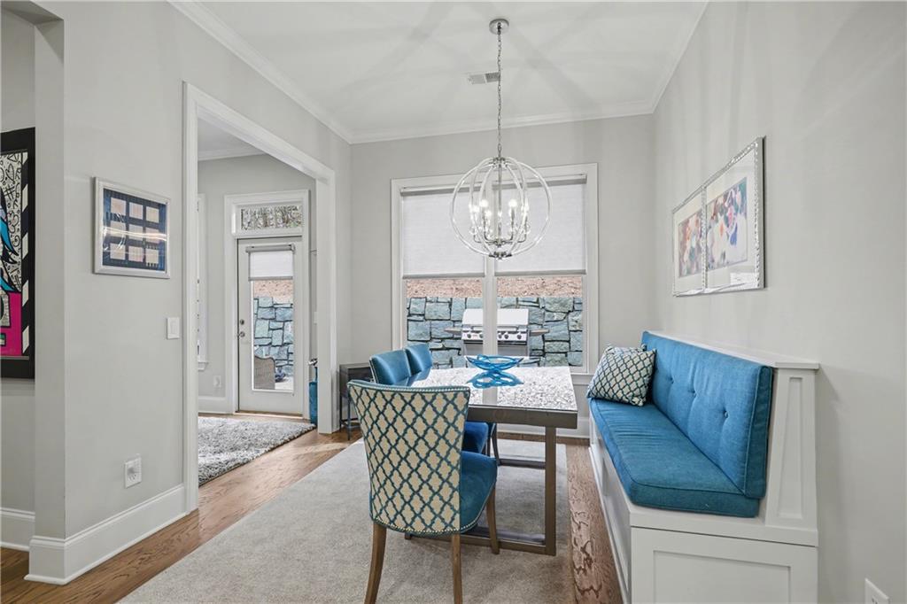 317 Riversedge Drive Atlanta, GA 30339 - Photo 15 of 49 a living room with furniture and a chandelier