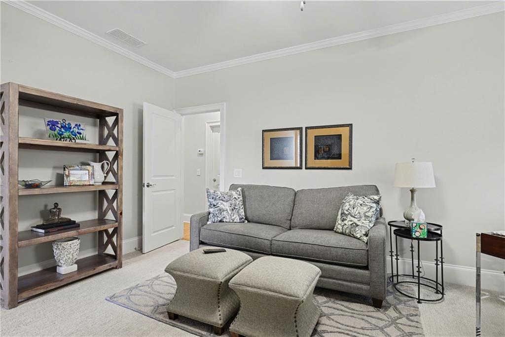 317 Riversedge Drive Atlanta, GA 30339 - Photo 26 of 49 a living room with furniture and a couch