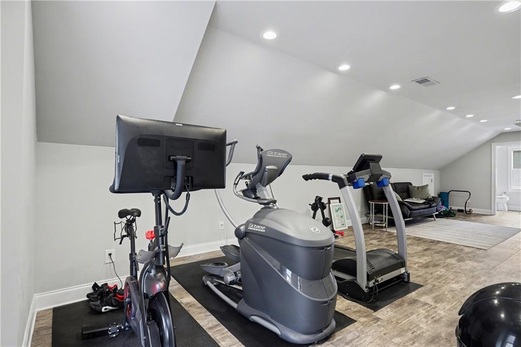 317 Riversedge Drive Atlanta, GA 30339 - Photo 30 of 49 a view of a room with gym equipment