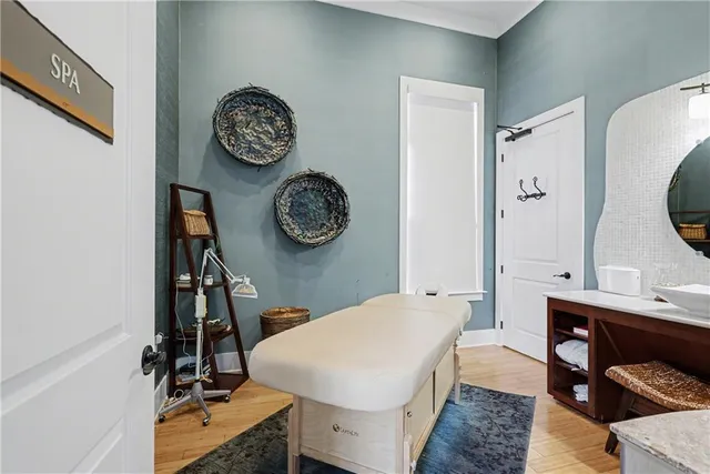 a view of a hallway with seating area