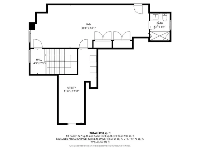 a black and white photo of a living room