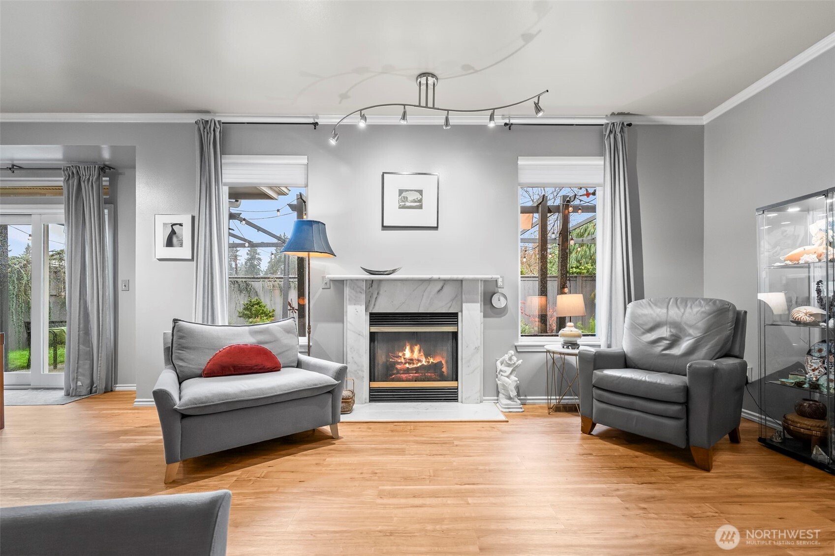 1113 Garden Circle Fircrest, WA 98466 - Photo 12 of 29 a living room with furniture and a fireplace