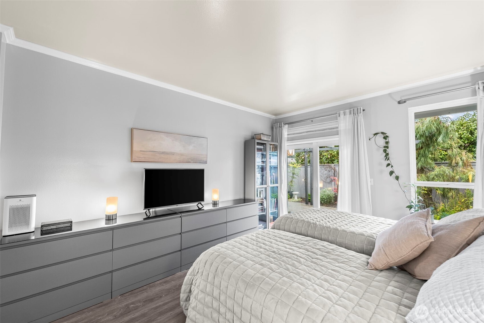 1113 Garden Circle Fircrest, WA 98466 - Photo 13 of 29 a bedroom with a flat screen tv and a bed