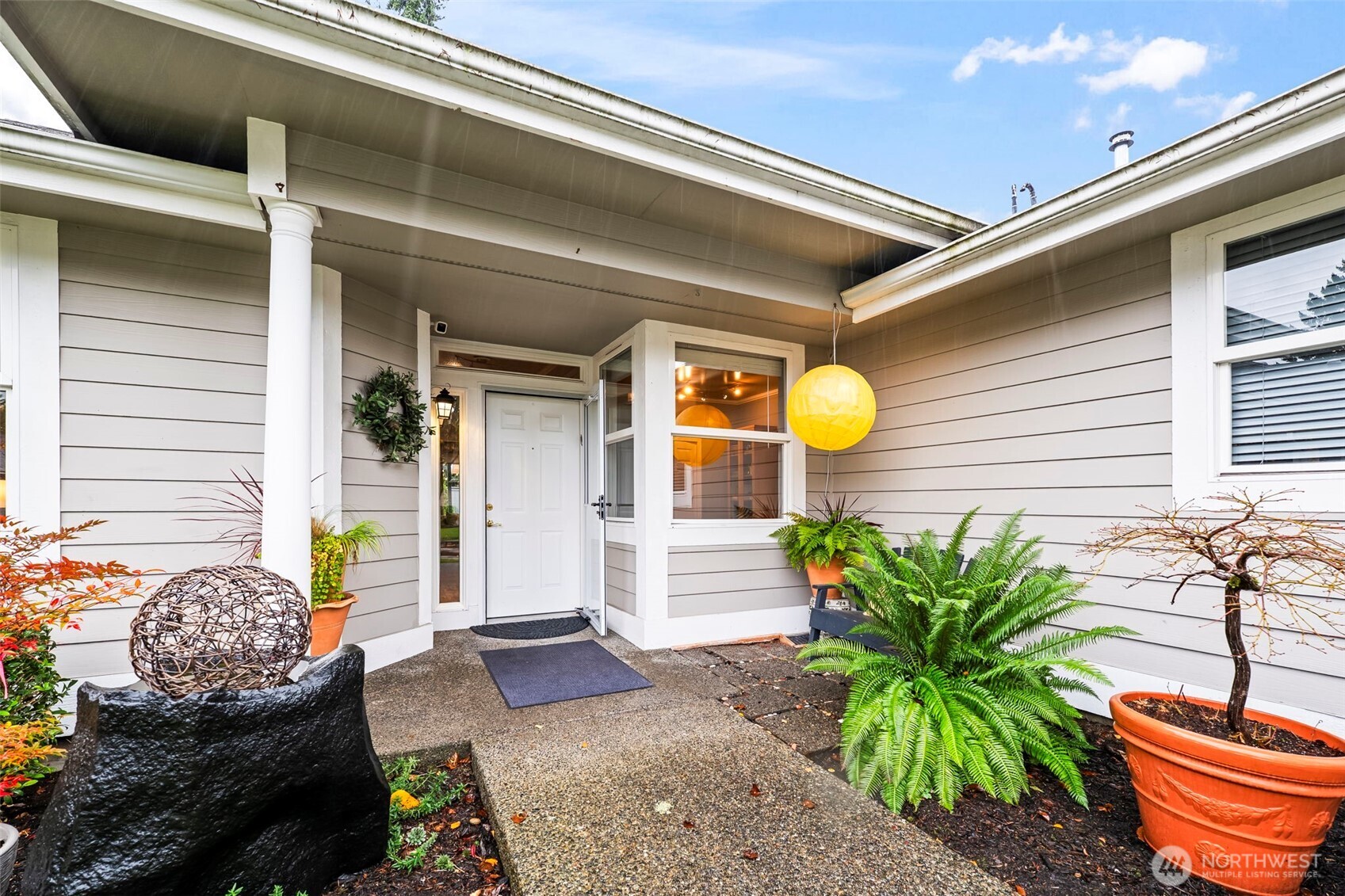 1113 Garden Circle Fircrest, WA 98466 - Photo 2 of 29 a front view of a house with outdoor seating