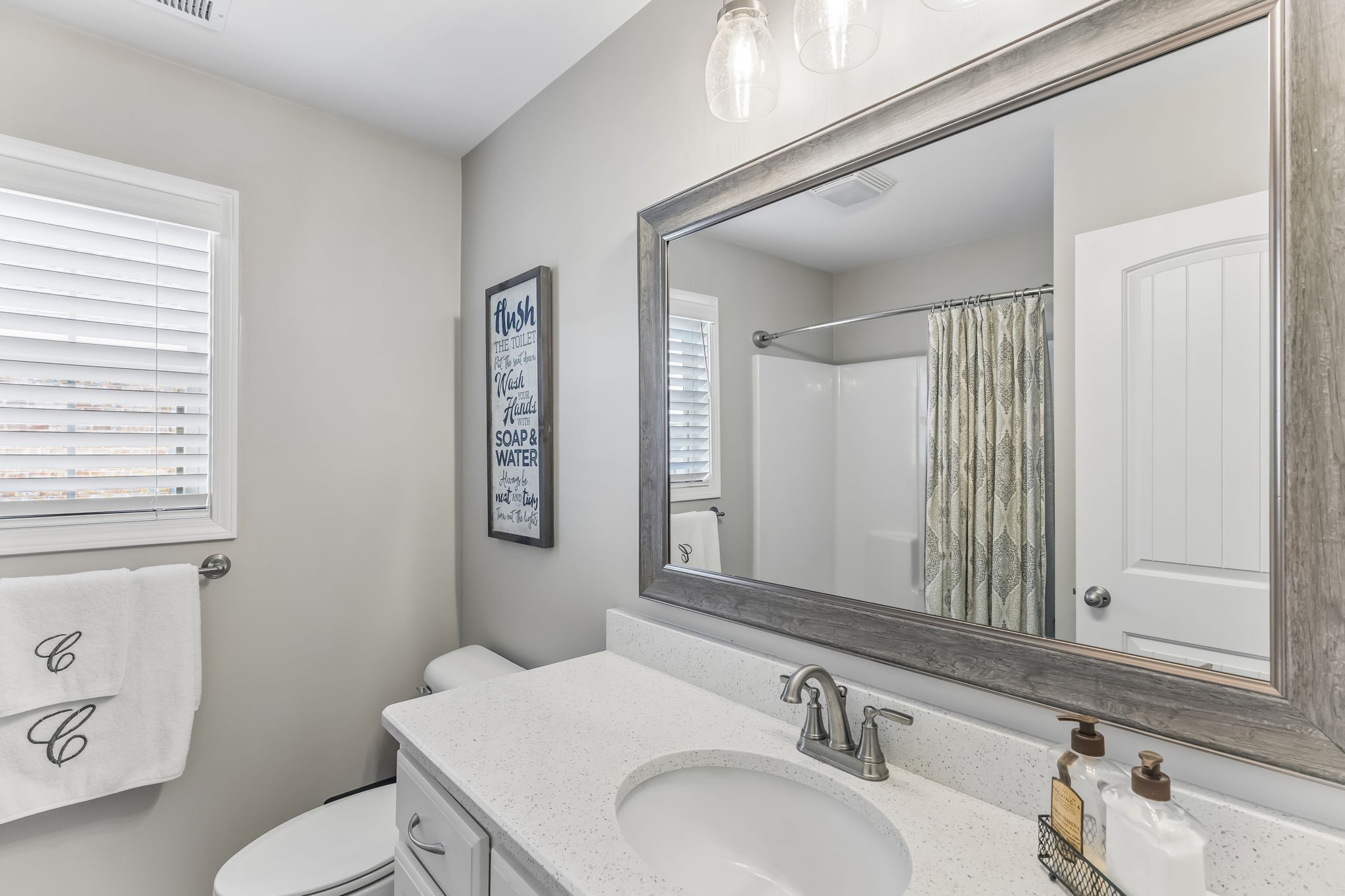 343 Wildcat Run Gallatin, TN 37066 - Photo 18 of 29 a bathroom with a sink vanity mirror and toilet
