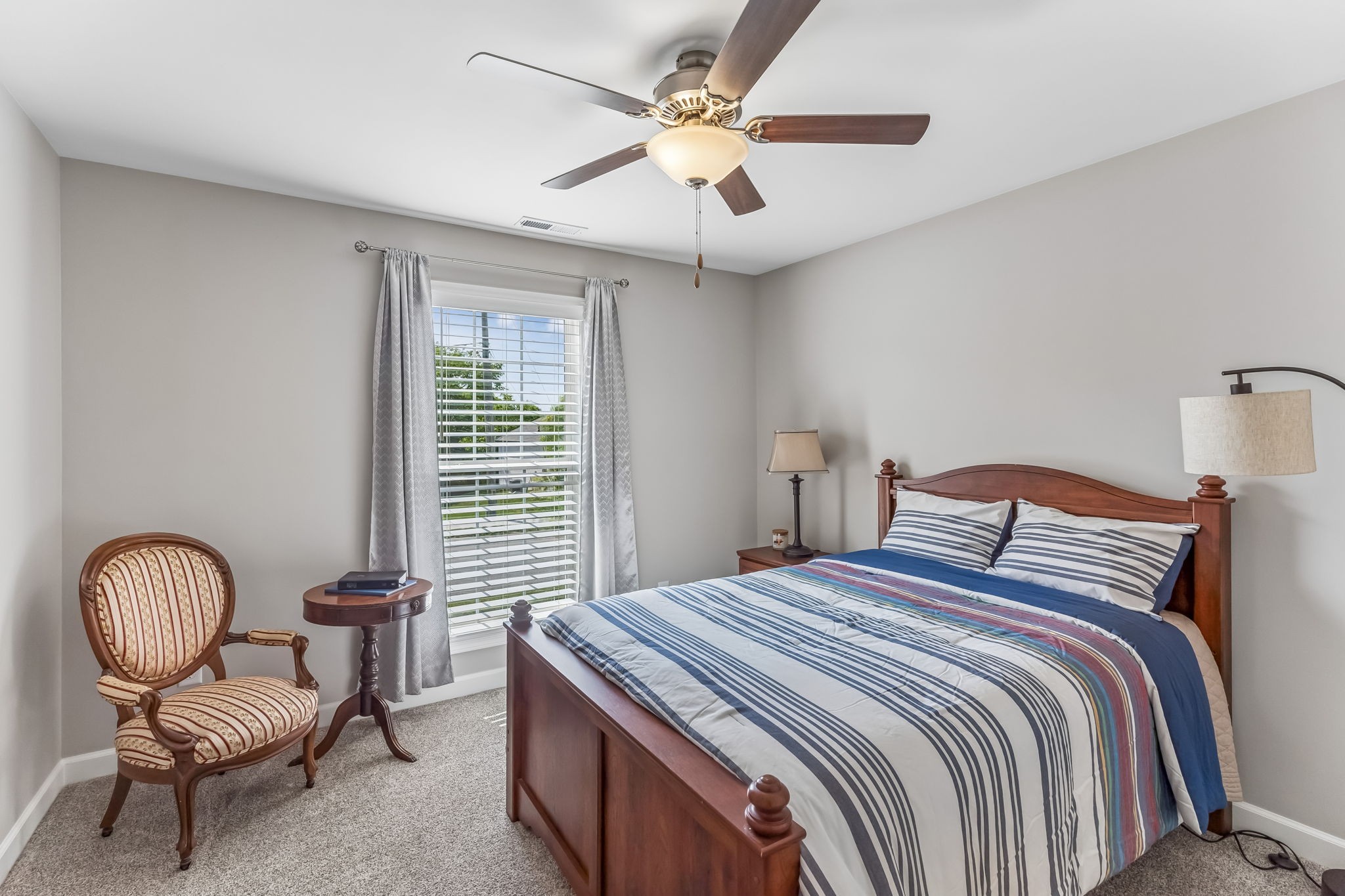 343 Wildcat Run Gallatin, TN 37066 - Photo 20 of 29 a bedroom with a bed chair and a window
