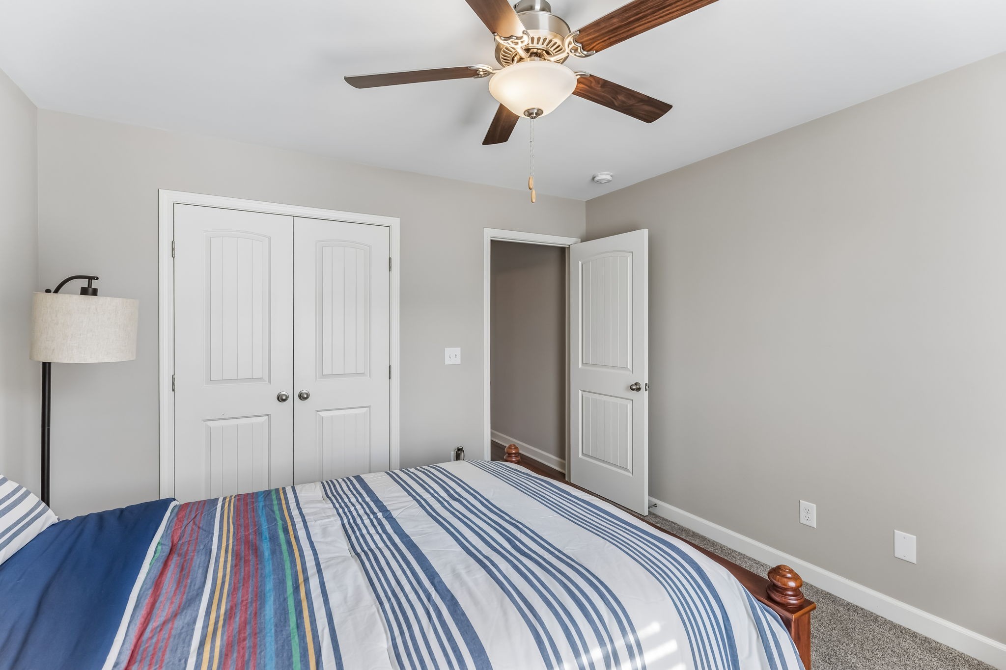 343 Wildcat Run Gallatin, TN 37066 - Photo 21 of 29 a bedroom with a bed and a chandelier