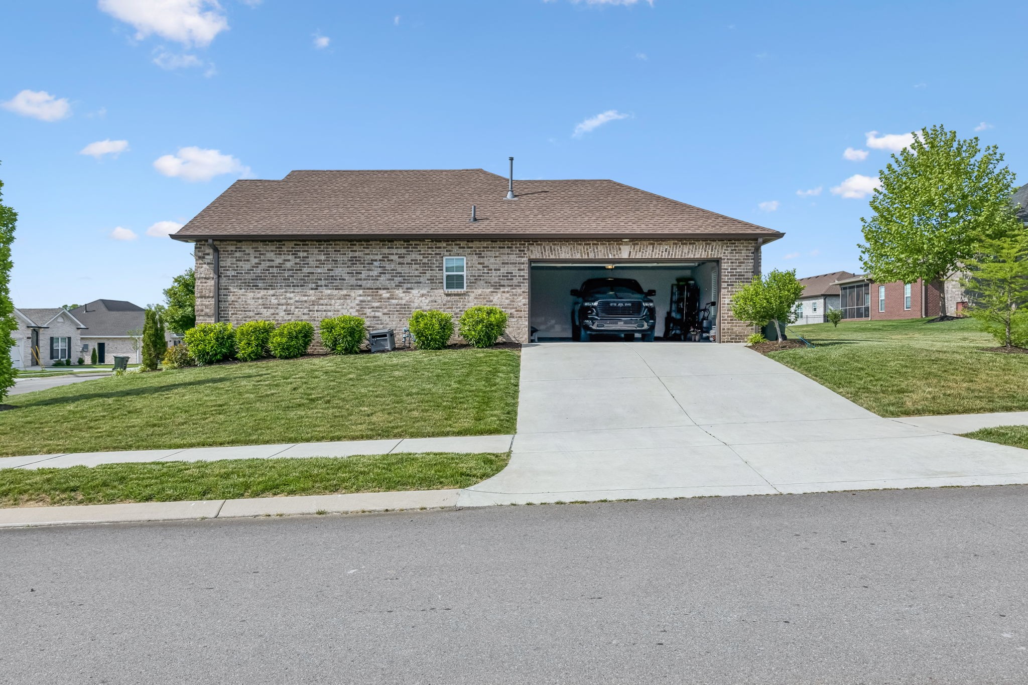 343 Wildcat Run Gallatin, TN 37066 - Photo 28 of 29 a front view of a house with a yard and garage