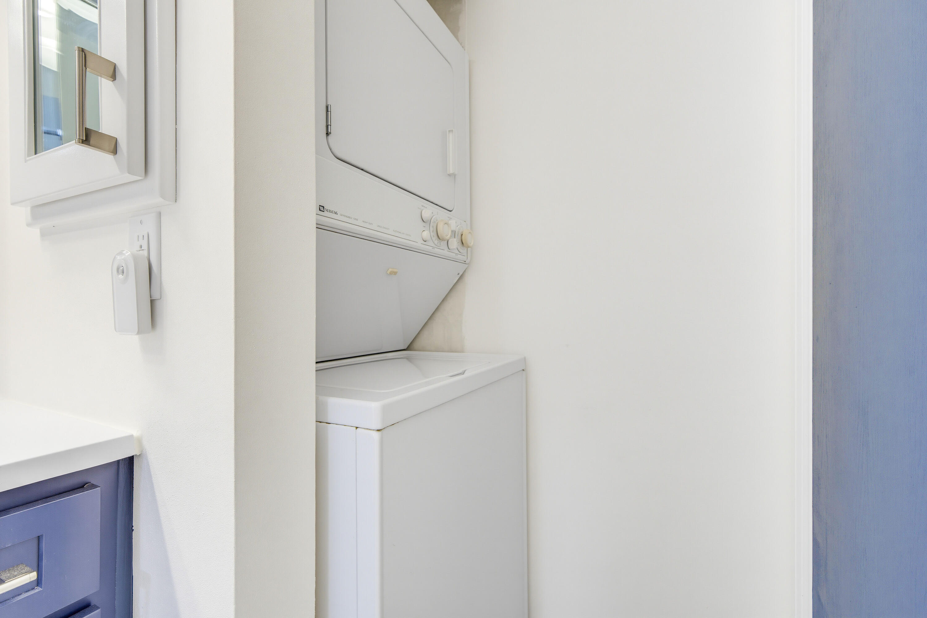 1730 West Green Tree Road, Unit 309 Glendale, WI 53209 - Photo 24 of 42 In unit laundry in primary bath.