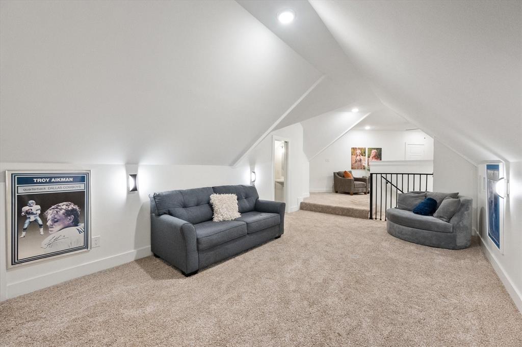1911 Ozro Road Venus, TX 76084 - Photo 31 of 40 a living room with furniture and a painting on the wall