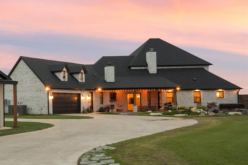 1911 Ozro Road Venus, TX 76084 - Photo 36 of 40 a front view of a house with a yard