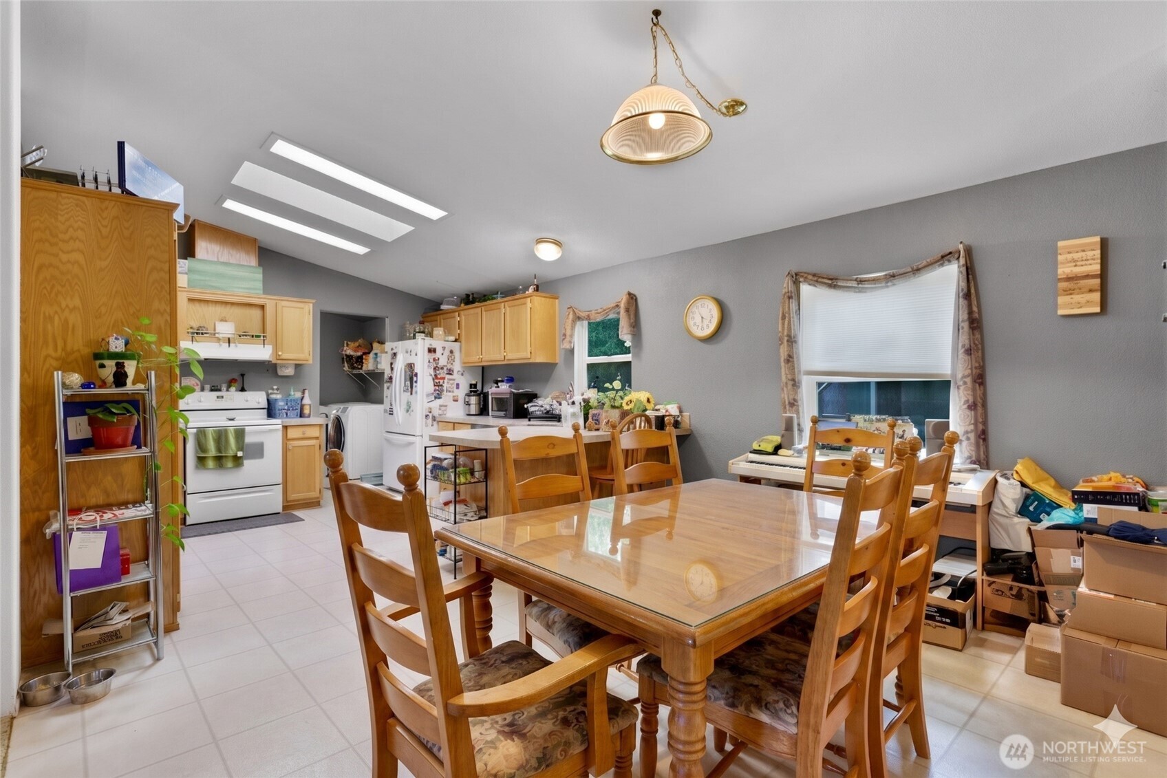 7928 Portal Way Custer, WA 98240 - Photo 14 of 39 a view of a dining room with furniture and a chandelier