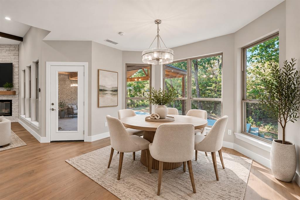 108 Winding Way Azle, TX 76020 - Photo 12 of 38 Virtually staged wood-finish flooring, recessed lighting, and a white interior door with clear glass