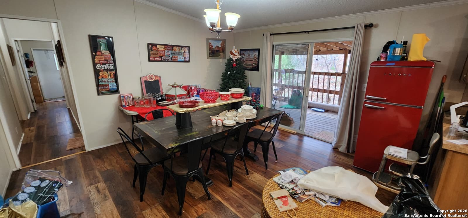6020 Apache Moon Spring Branch, TX 78070 - Photo 2 of 22 a view of a dining room with furniture window and wooden floor