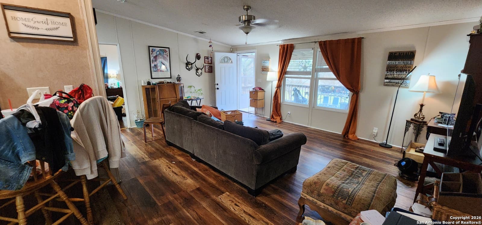 6020 Apache Moon Spring Branch, TX 78070 - Photo 5 of 22 a living room with furniture a flat screen tv and a large window
