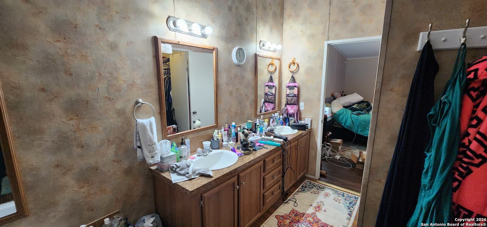 6020 Apache Moon Spring Branch, TX 78070 - Photo 6 of 22 a bathroom with a sink and a mirror