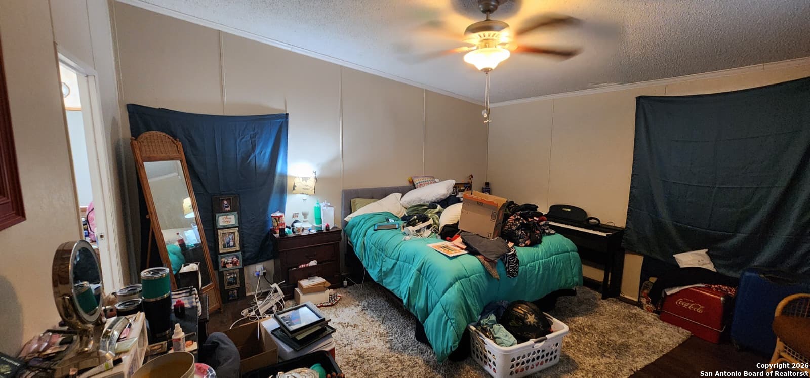 6020 Apache Moon Spring Branch, TX 78070 - Photo 7 of 22 a living room with furniture and a chandelier