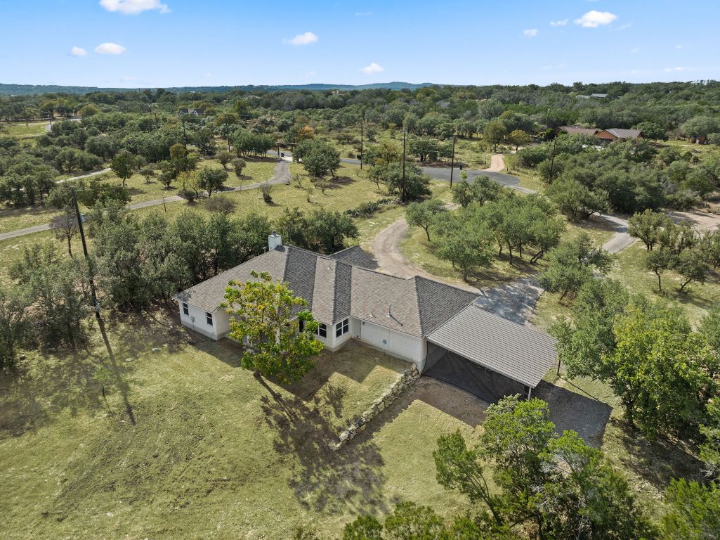 2201 Improver Road Spicewood, TX 78669 - Photo 26 of 26 an aerial view of a house with a yard