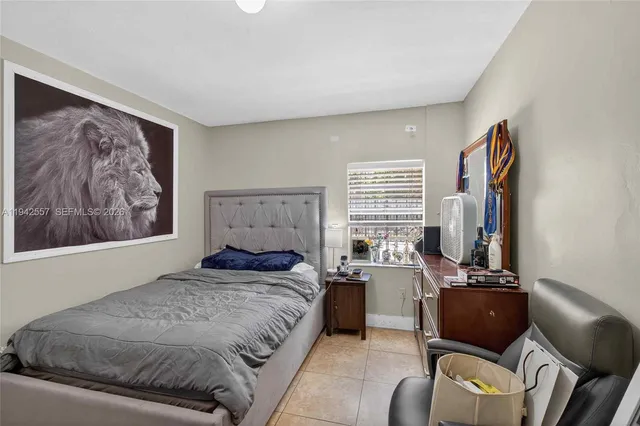 a bedroom with a bed and furniture