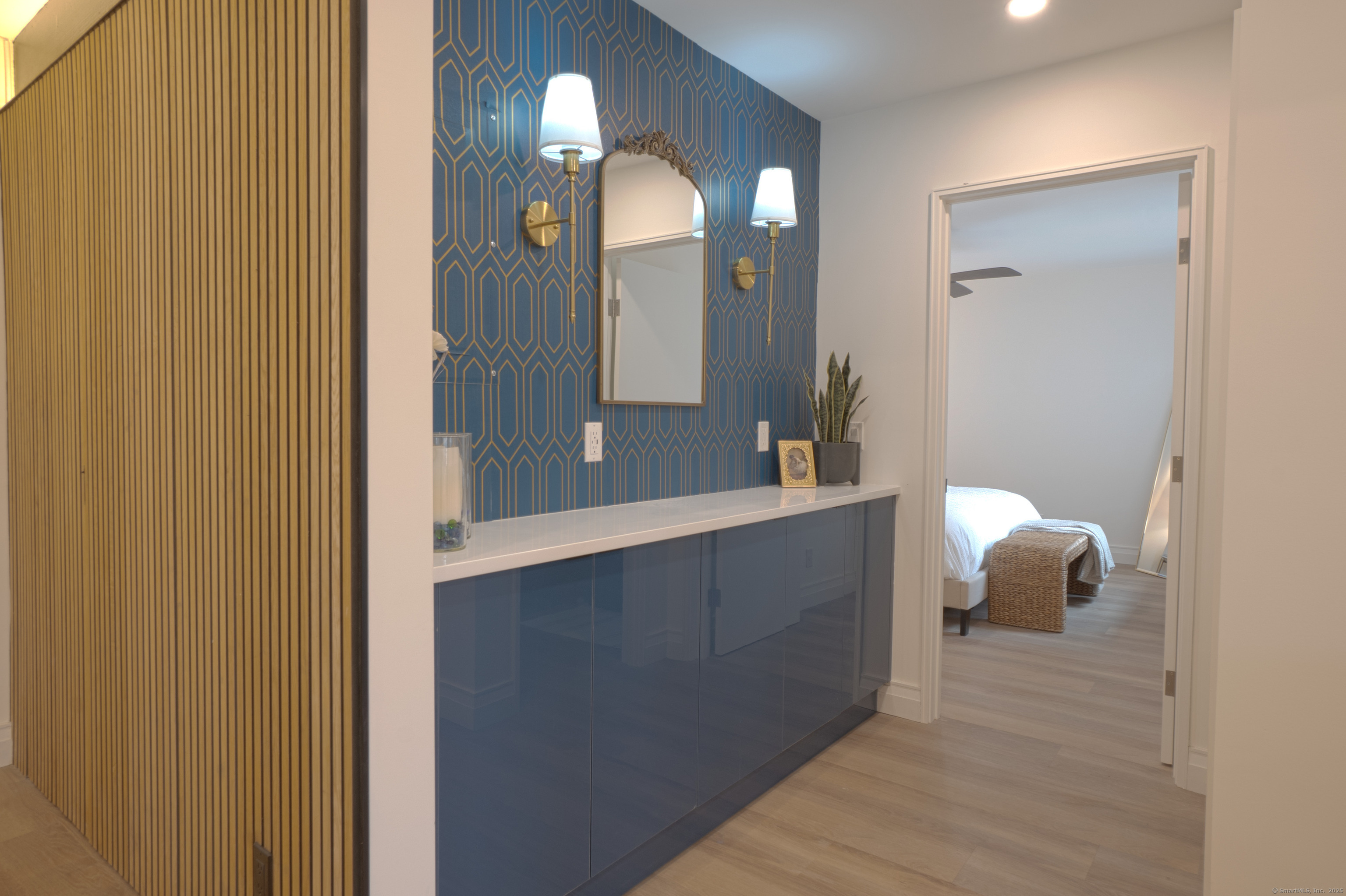 7 4th Street, Unit 4F Stamford, CT 06905 - Photo 13 of 19 Stylish shelving, kiosks and storage view from living room.