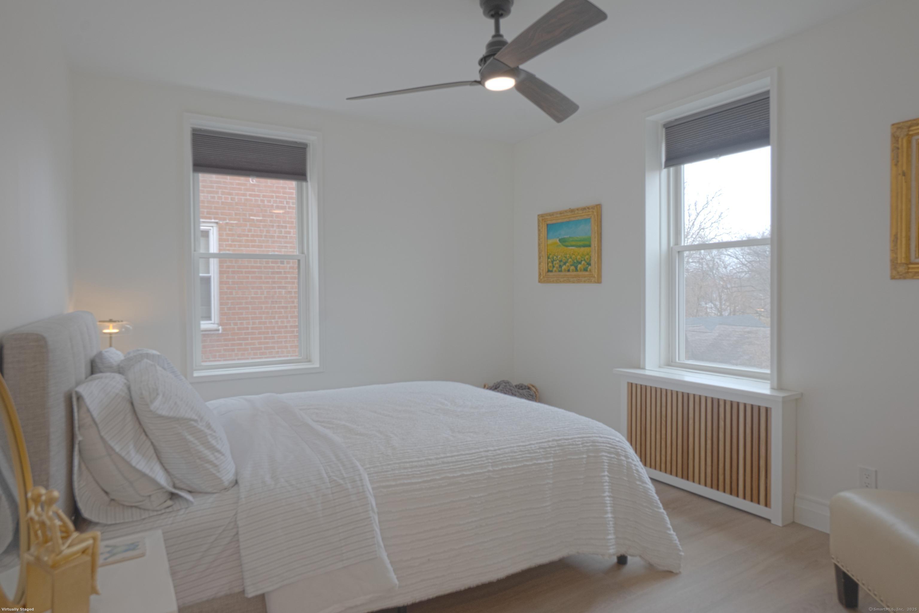 7 4th Street, Unit 4F Stamford, CT 06905 - Photo 17 of 19 Side view of guest bedroom from living room.