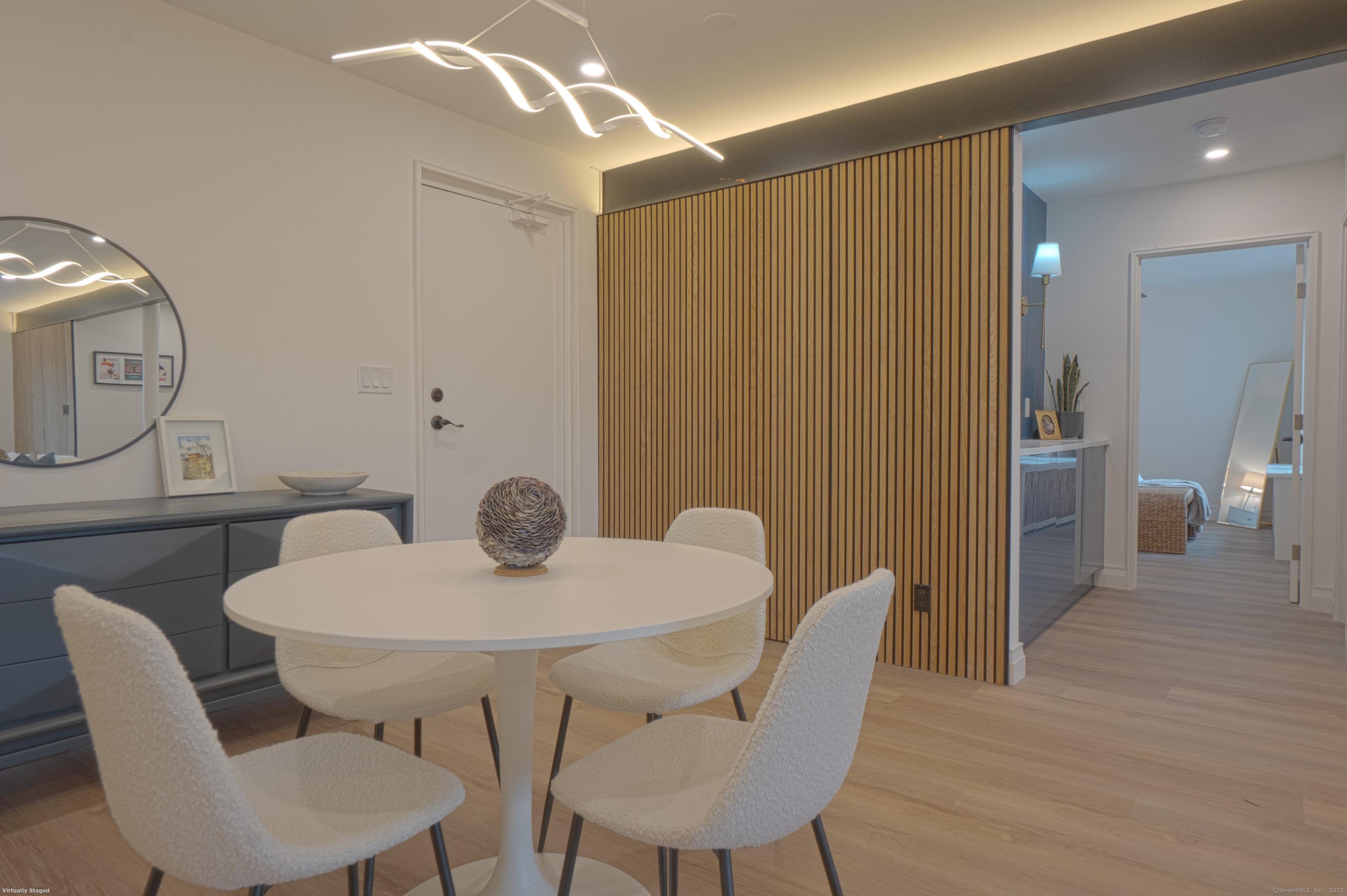 7 4th Street, Unit 4F Stamford, CT 06905 - Photo 2 of 19 Dining area view from living room.