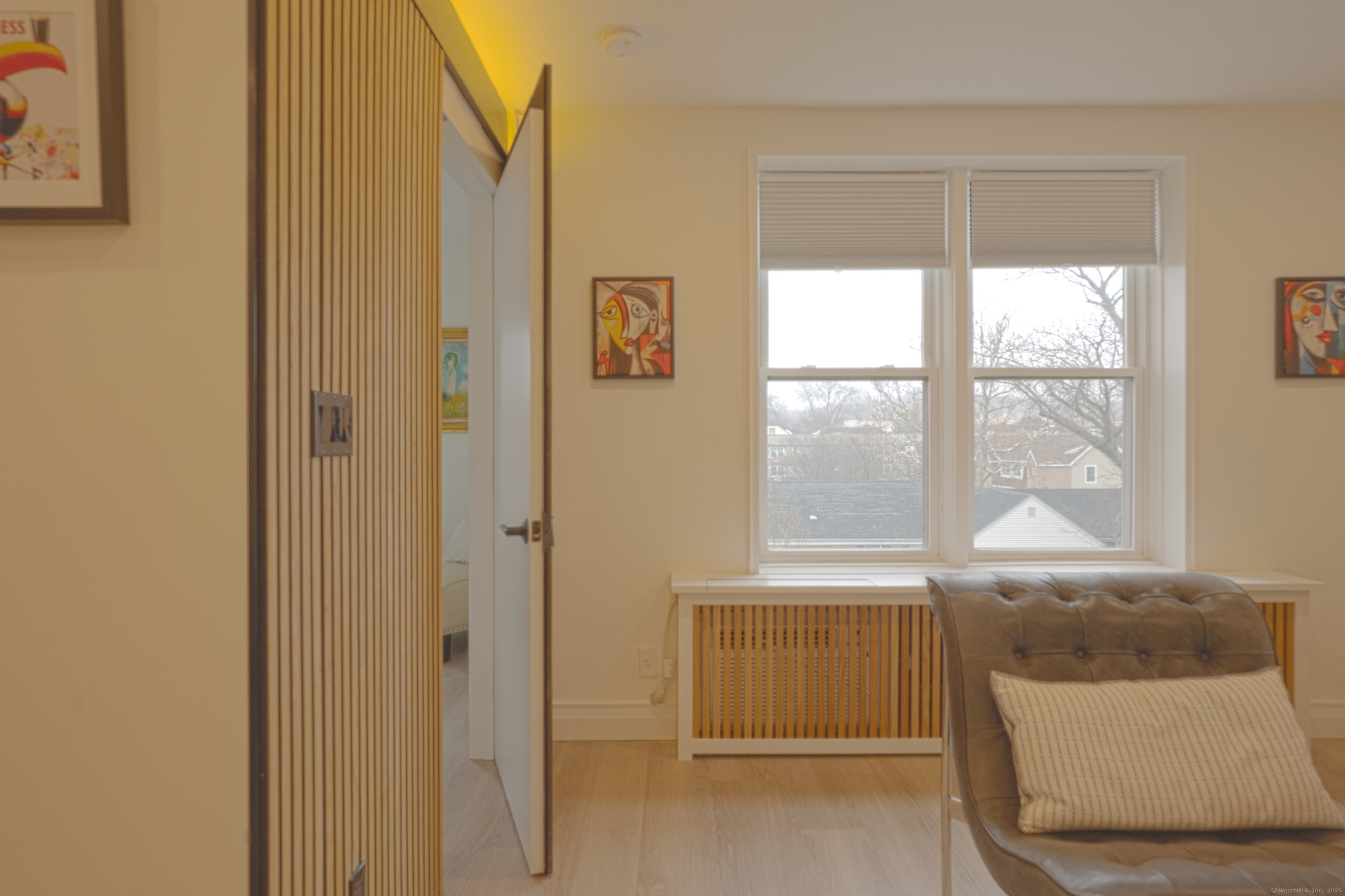 7 4th Street, Unit 4F Stamford, CT 06905 - Photo 5 of 19 Spacious living room view with double windows.