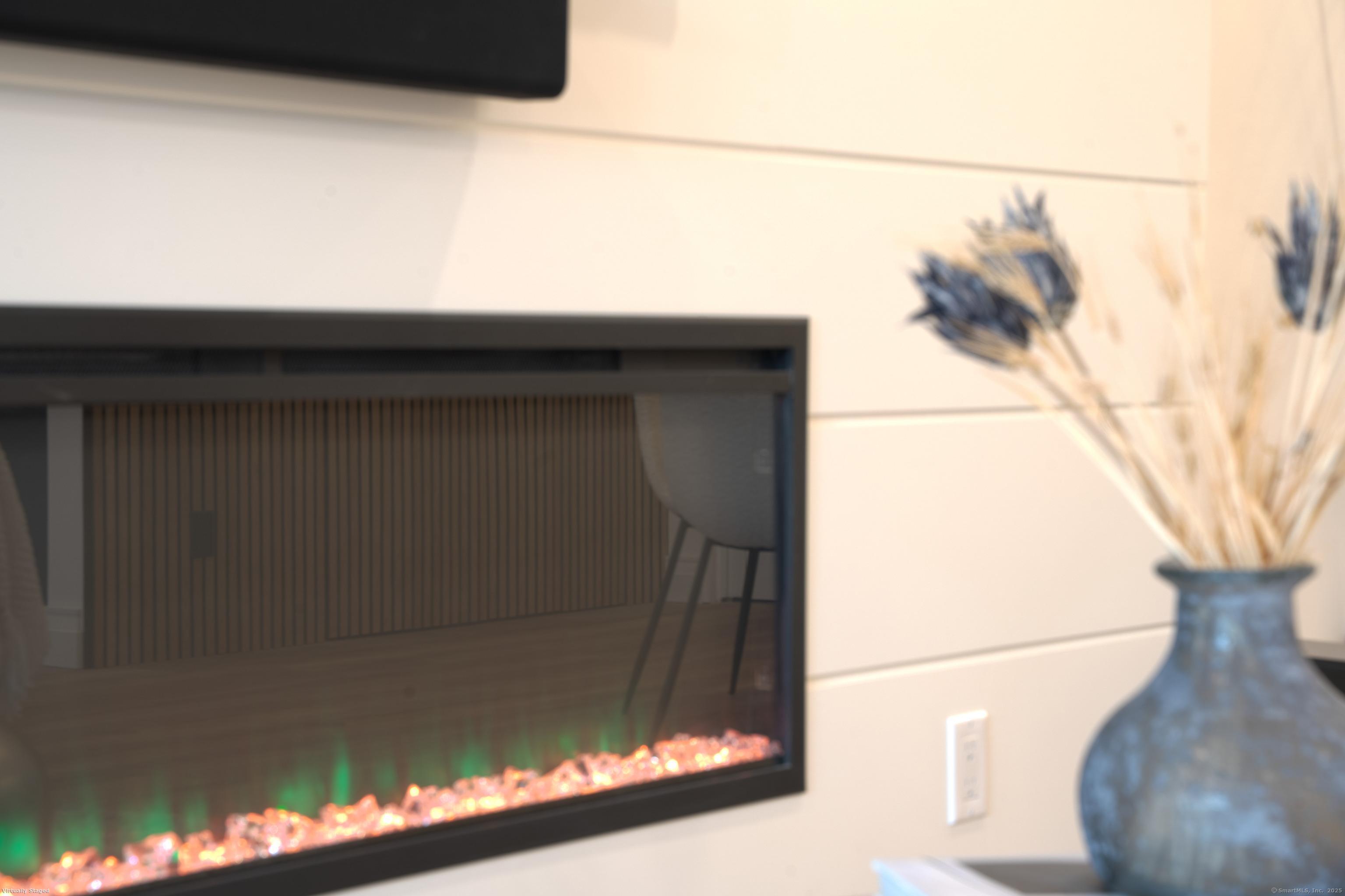 7 4th Street, Unit 4F Stamford, CT 06905 - Photo 8 of 19 Electric fireplace for your enjoyment.