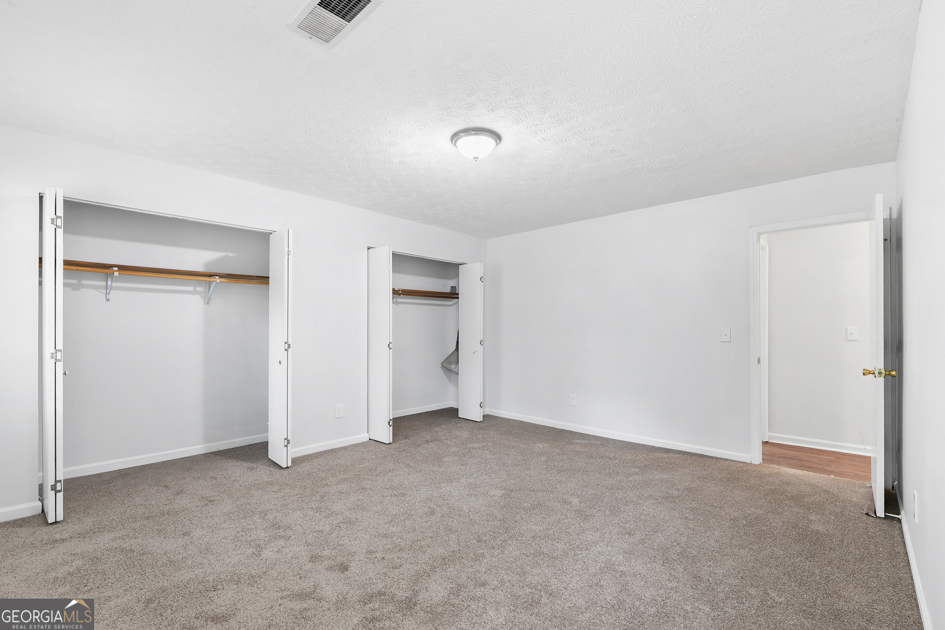 1328 Foxvale Drive Hampton, GA 30228 - Photo 13 of 27 a view of an empty room