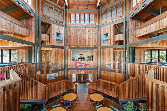 a view of a patio with a table and chairs