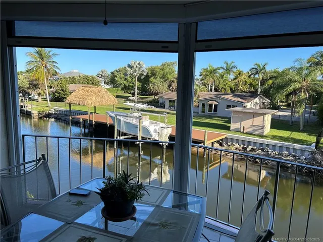 a view of a lake from a balcony