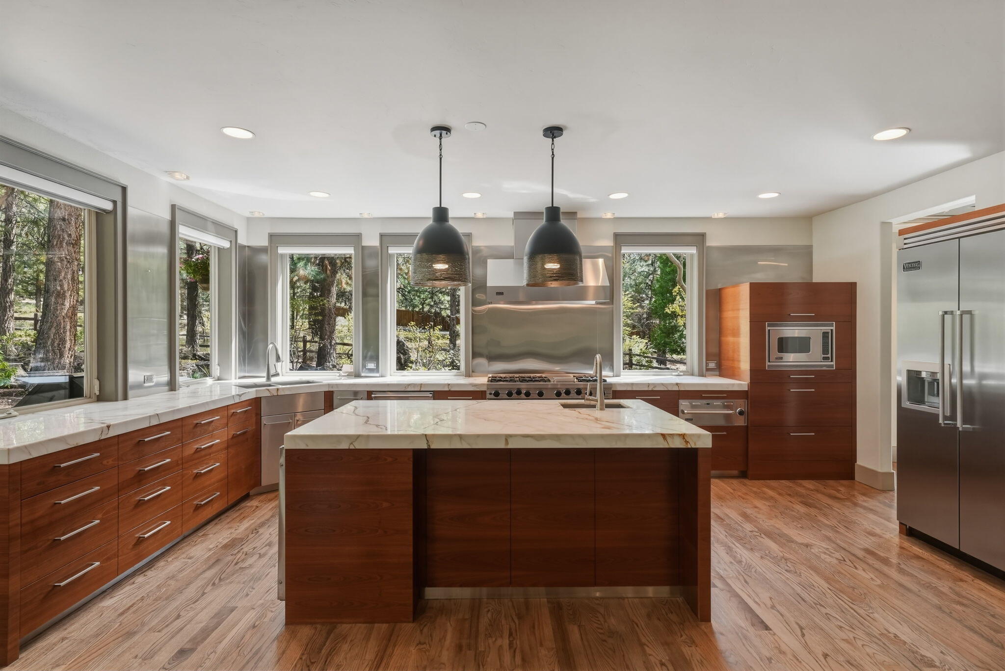 240 Northwest Skyliner Summit Loop Bend, OR 97703 - Photo 11 of 77 Gorgeous windows & marble counter tops.