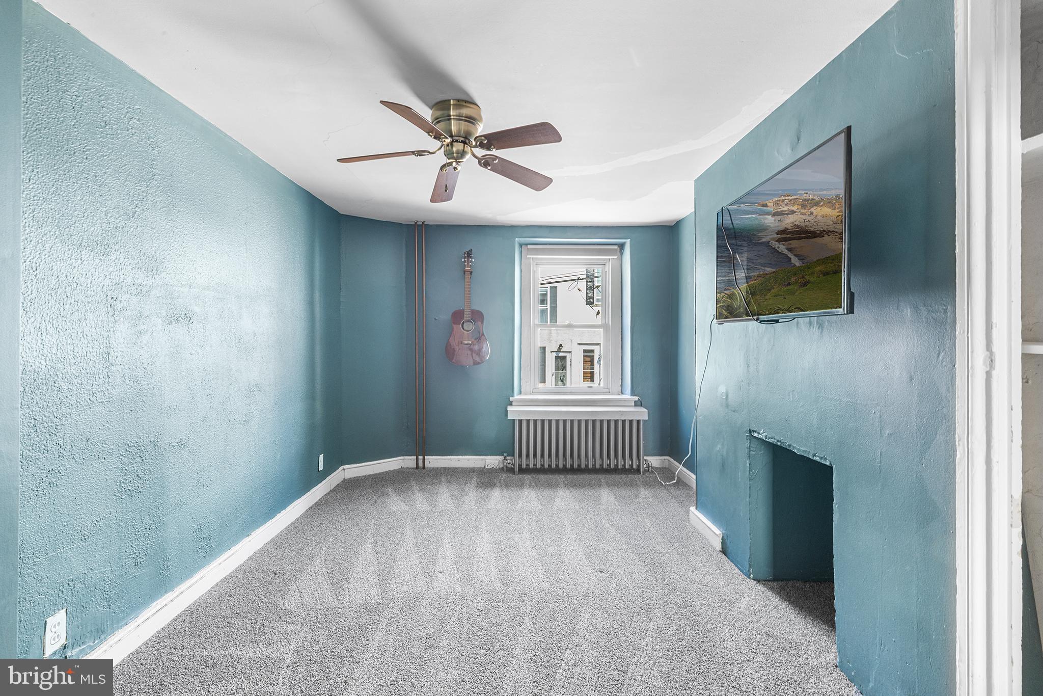 157 Cotton Street Philadelphia, PA 19127 - Photo 12 of 26 a view of an empty room with a window