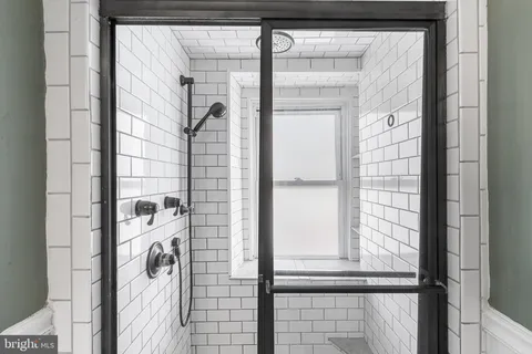 a view of a door and a window