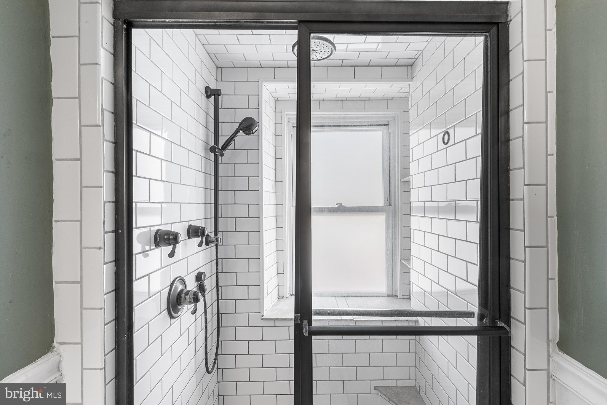 157 Cotton Street Philadelphia, PA 19127 - Photo 15 of 26 a view of a door and a window