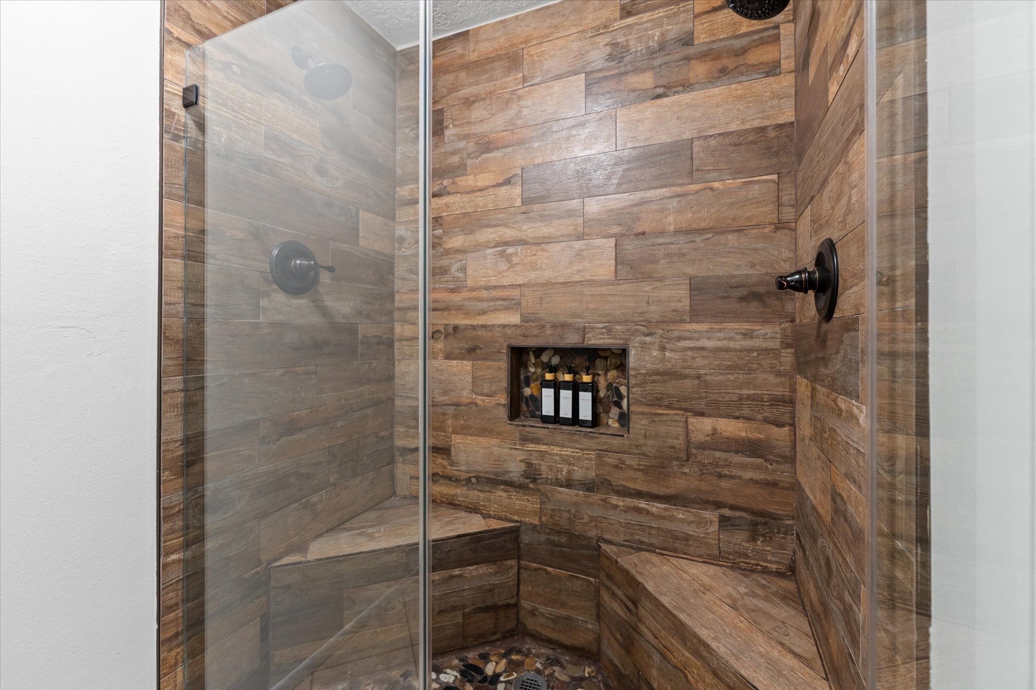 145 Capetown Way Conroe, TX 77356 - Photo 25 of 38 a bathroom with a shower