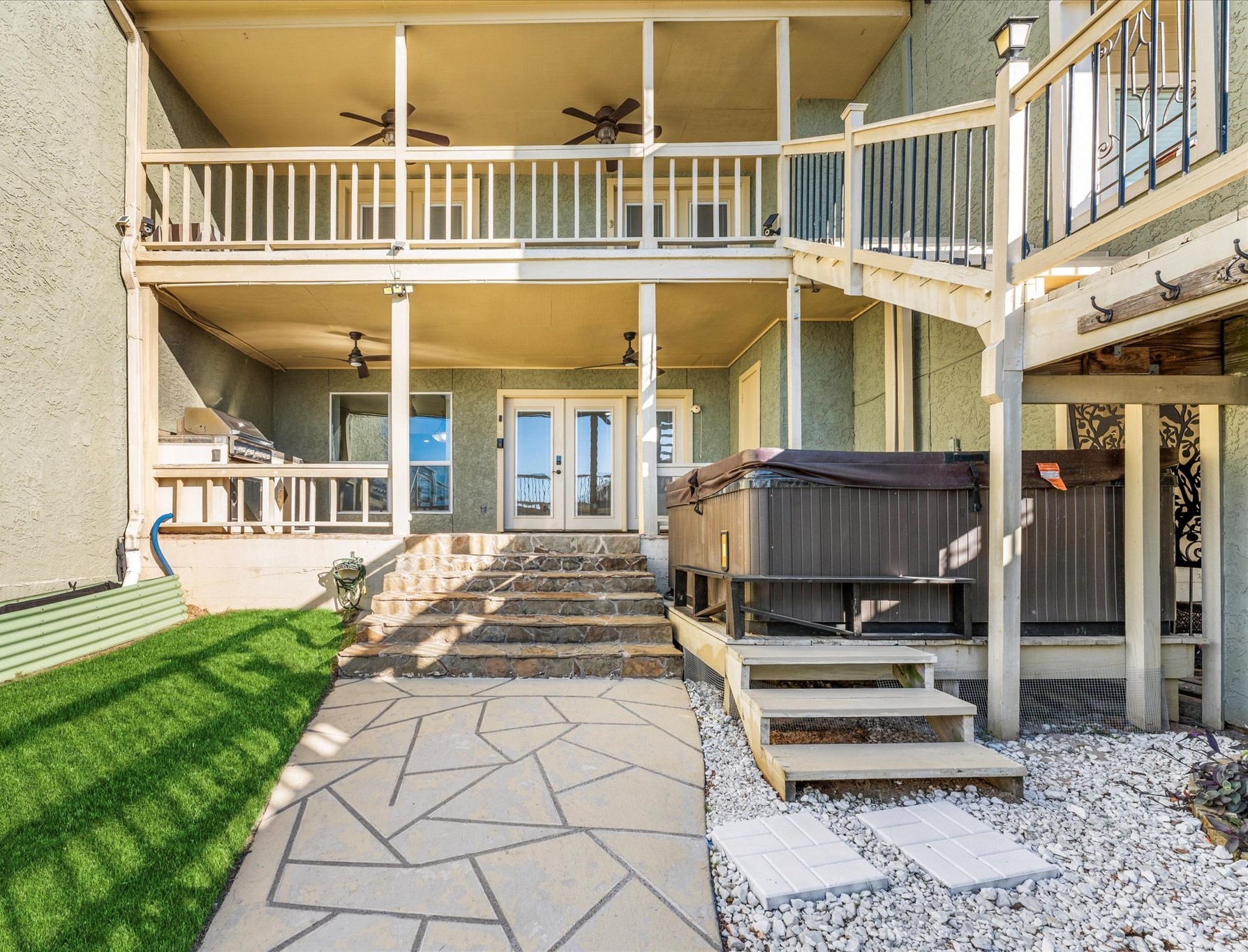 145 Capetown Way Conroe, TX 77356 - Photo 26 of 38 a front view of a house with a yard and seating space