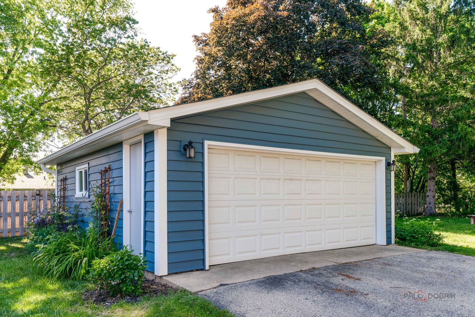 489 1st Street Antioch, IL 60002 - Photo 33 of 33 a backyard of a house with garage