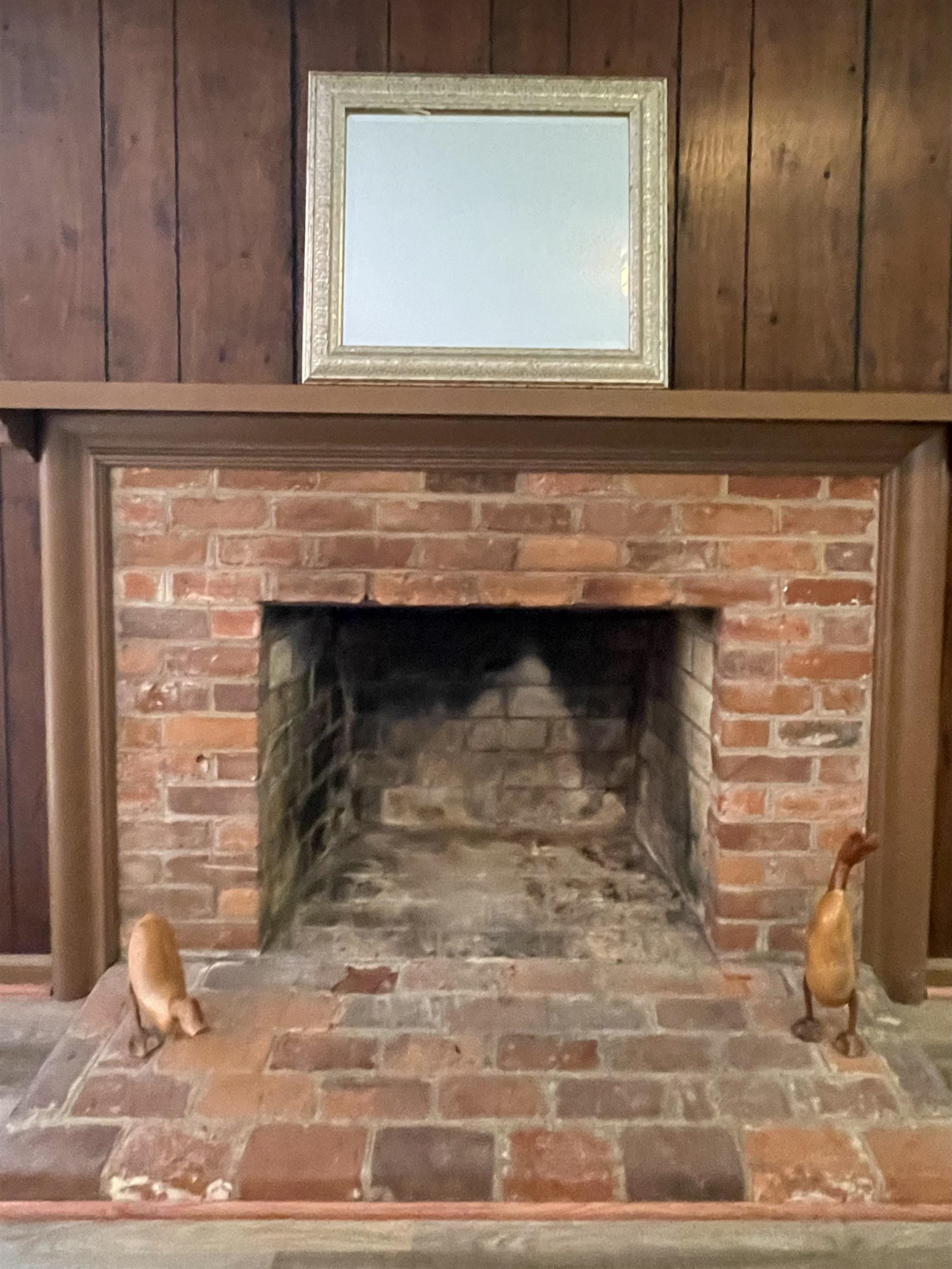 4506 Malvern Road Durham, NC 27707 - Photo 34 of 40 Brick hearth wood burning fireplace. Current owners didn't use the fireplace and had it closed for energy conservation. Current cap can be removed and a venting chimney cap installed to make the fireplace functional again. Fireplace