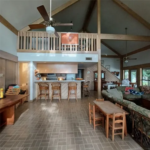a group of chairs sitting in kitchen and dining room